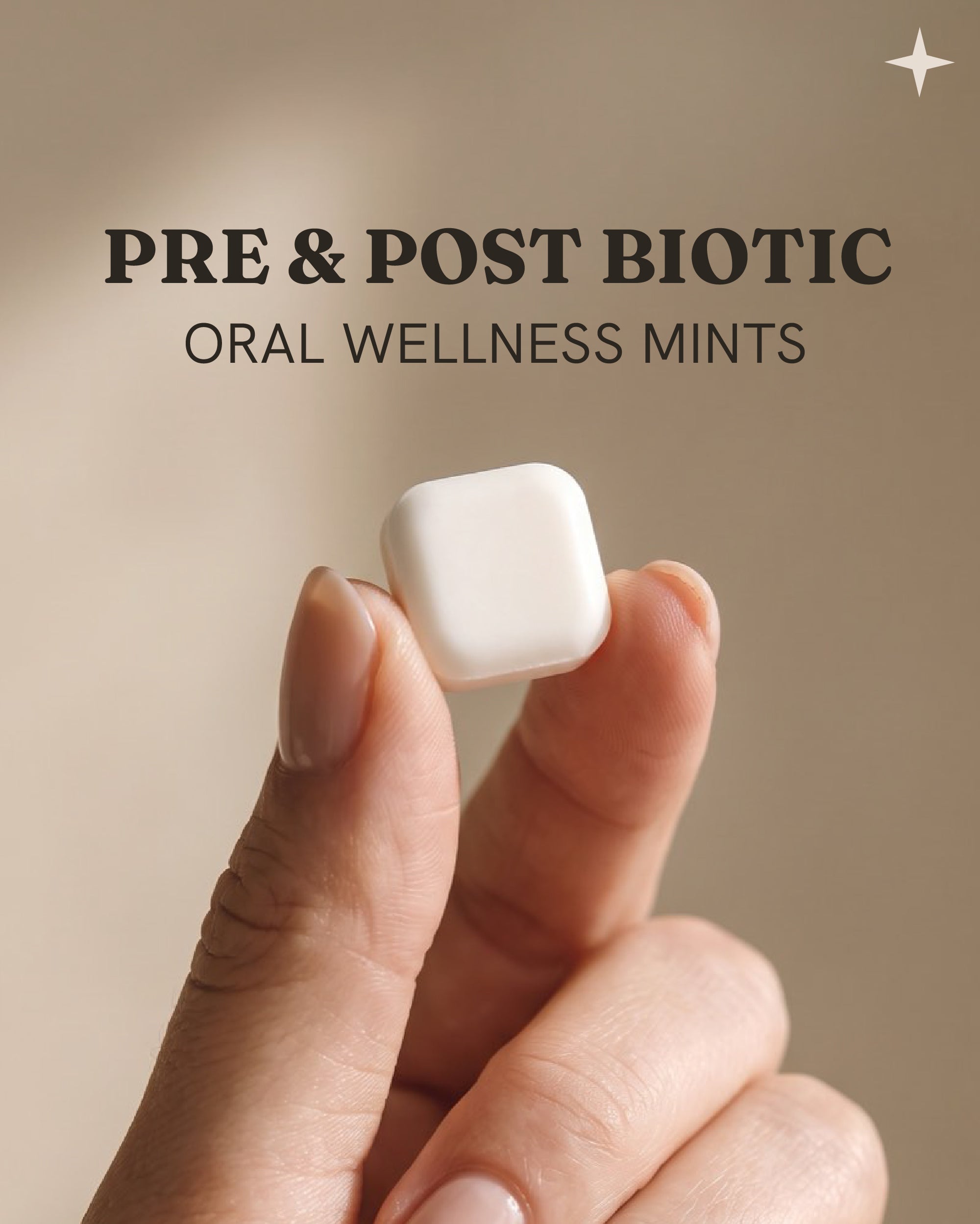 Âire mint held between fingertips, pre and postbiotic oral wellness mints