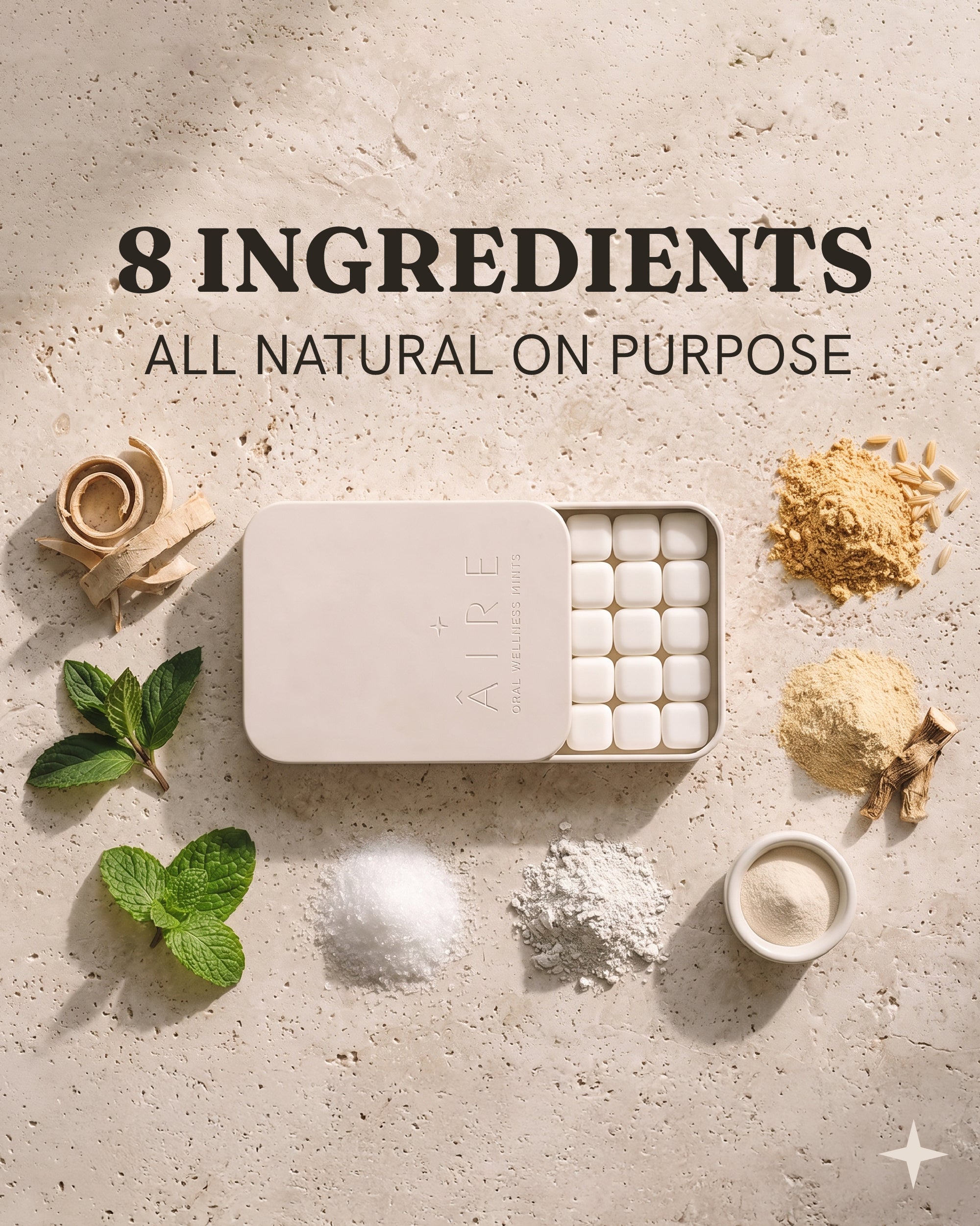 Âire open tin with the 8 ingredients laid out on travertine
